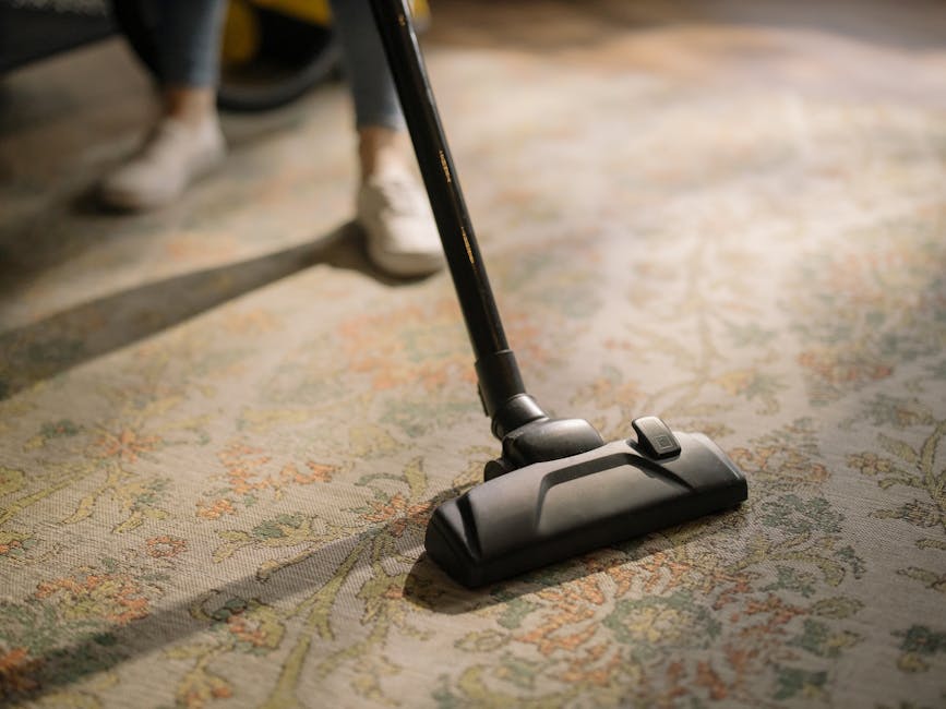 Vacuuming a bright and clean carpeted floor